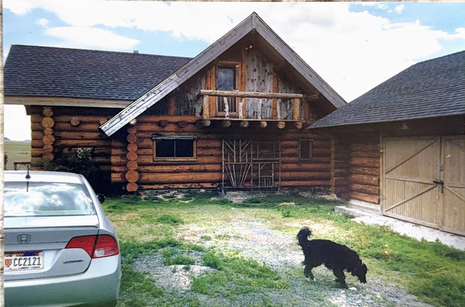 The log home against open country.